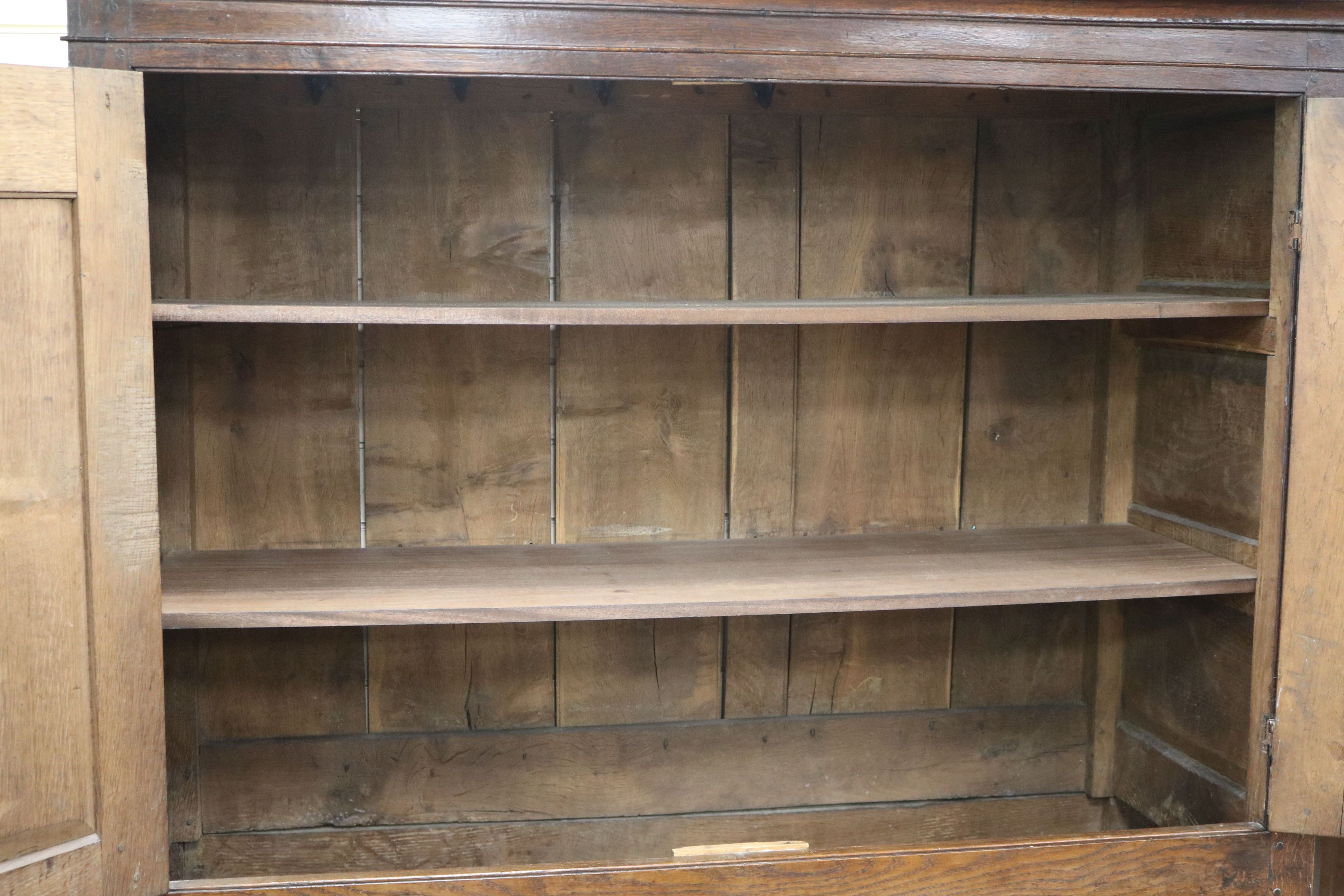 A George II oak press cupboard W.135cm - Image 4 of 4