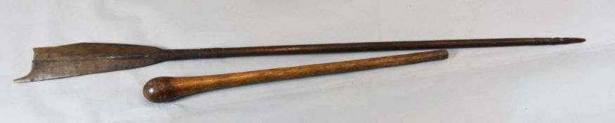 A Polynesian carved wood paddle club, 186cm and another club, 95cm