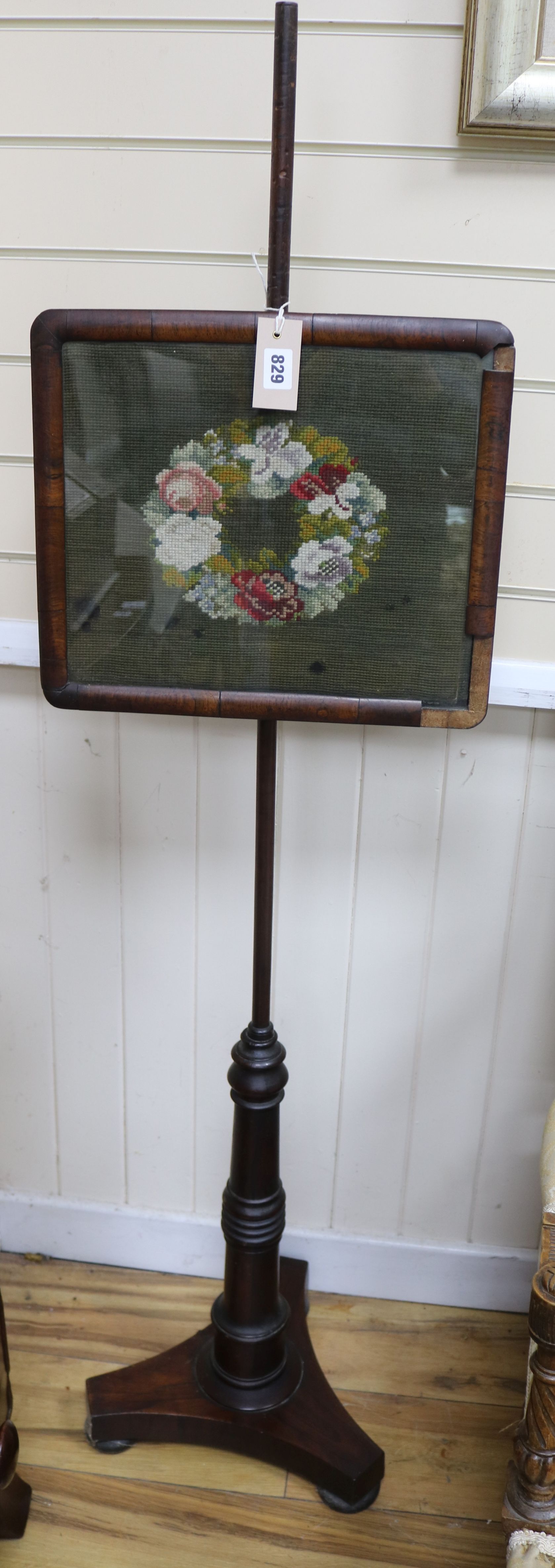 A Regency pole screen W.38cm