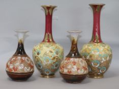 Two pairs of Doulton Slaters Patent narrow neck vases, one pair with floral-decorated yellow