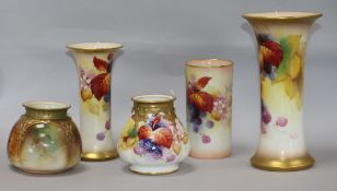 Five Royal Worcester vases painted with autumn leaves and berries, various, including two tapered