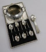 A George III silver sugar bowl and two sets of six silver teaspoons.