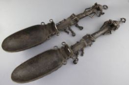 A pair of Yoruba of Ogboni Secret Society bronze ladles, with figural handles, 65cmProvenance: Ex.
