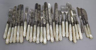 A set of twelve pairs of Victorian mother of pearl handled silver dessert eaters, Aaron Hadfield,
