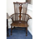 A mid 18th century "Thames Valley" elm, ash and beech comb back elbow chair