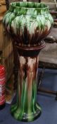A Victorian pottery jardiniere on stand