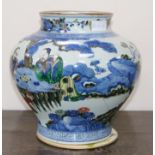 A large Chinese wucai jar, 19th century, painted in Transitional style with scholars seated at a