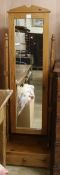 A pine cheval mirror, fitted base drawer W.51cm