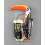 A rare Carltonware Guinness toucan and pint glass wall appliqué, impressed number GA2492, height
