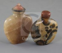 A Chinese pudding stone snuff bottle and a Chinese crystal snuff bottle, 19th century, each of