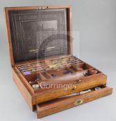 A Victorian J. Newmans Manufactory of Soho Square mahogany artists's box, with many of the