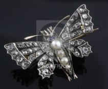 A Victorian style gold and silver, split pearl, sapphire and rose cut diamond set butterfly