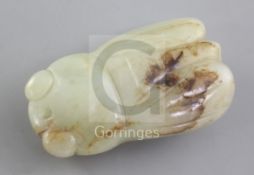 A Chinese pale celadon and brown jade carving of a cicada, Qing dynasty, the stone with russet and