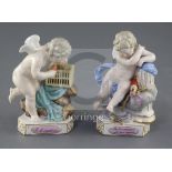 A pair of Meissen figures of Cupids, 19th century, the first of Cupid resting, the triangular base