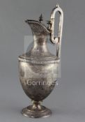 A Victorian silver vase shaped ewer, by Martin, Hall & Co, engraved with classical figure and