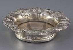 A Victorian silver wine coaster, by Henry Wilkinson & Co, with pierced vineous border and turned
