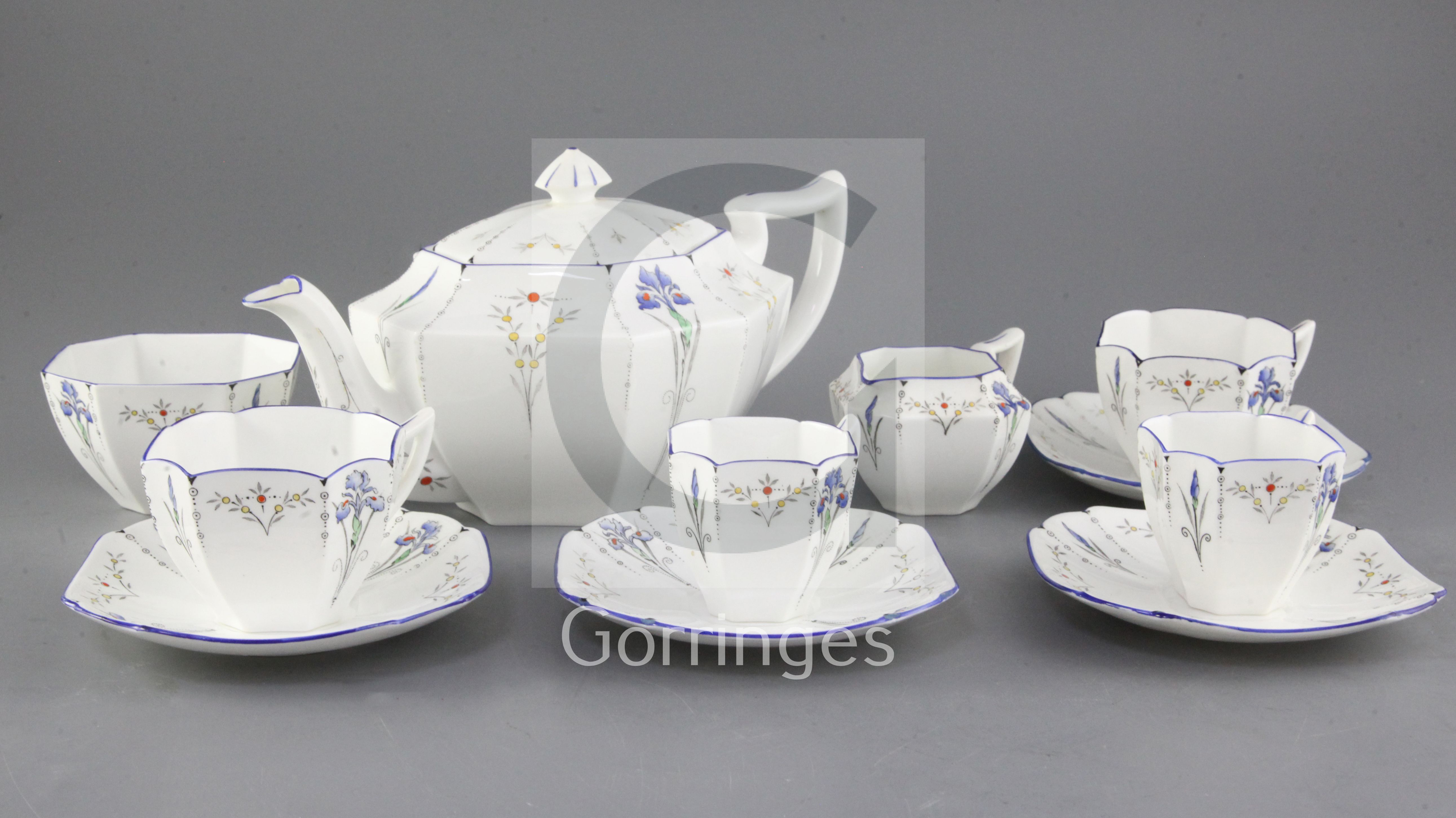 A quantity of Shelley 'Blue Iris' pattern tableware, comprising: two teapots (one smaller), coffee