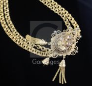 A Victorian style gold necklace, with pierced and gem set slide with scrolling border, overall