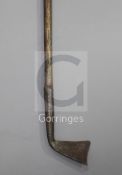 A rare 17th/18th century left handed spur toed golf club, the hand forged iron head with dished face