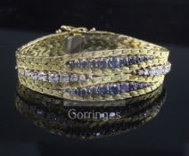 A gold sapphire and diamond set weave link bracelet, of tapering form and set with graduating