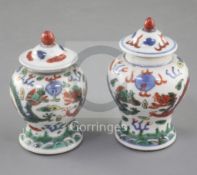 A near pair of Chinese miniature wucai baluster jars and covers, late 19th/early 20th century,