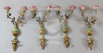 A set of six ormolu, simulated marble and porcelain twin branch wall lights, with rose sconces and