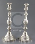 A pair of George V silver Sabbath Day candlesticks by Rosenzweig, Taitlebaum & Co, with waisted