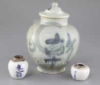 A Chinese blue and white calligraphic jar and cover, and two similar smaller jarlets, 16th/17th