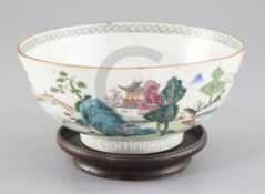 A Chinese famille rose 'landscape' bowl, Qianlong period, finely painted with figures in a river