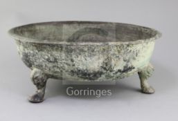 A Chinese archaic bronze tripod water basin, Pan, Warring States period, 4th/2nd century B.C., the