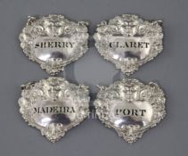 A set of four George III silver wine labels by Charles Rawlings, Claret, Port, Madeira & Sherry, all