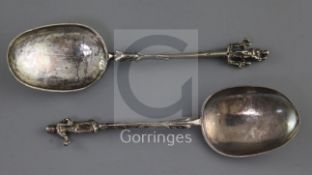 Two 19th century Dutch? silver 'apostle' spoons, with angular stems and rat tail bowls, stamped on