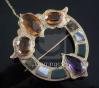 A Victorian engraved gold, Scottish hardstone, amethyst and citrine open pendant brooch, set with