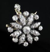 A Victorian gold, silver and diamond diamond flower head pendant brooch, set with old round cut