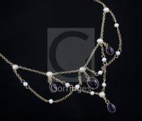 A Victorian style 9ct gold, cabochon amethyst and seed pearl drop necklace, 60cm.