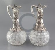 A good pair of Victorian silver mounted cut glass claret jugs by Horace Woodward & Co, with rustic