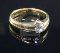 A 22ct gold and oval-cut diamond solitaire ring, the stone weighing approximately 0.50cts, gross 6.5