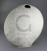 § James Tower (1919-1988). A large stoneware disc shaped vase, c.1983, the white tin-glaze with