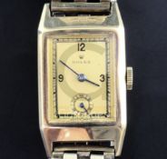 A gentleman's 1930's 9ct gold Rolex rectangular dress wrist watch, with Arabic numerals and