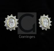 A pair of 18ct gold and oval diamond cluster earrings, 12mm.