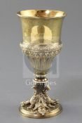 A Victorian silver gilt chalice, by Colen Hewer Cheshire, with dragon supports, Birmingham, 1872,