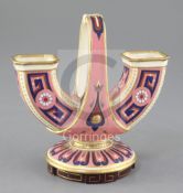 Christopher Dresser (1834-1904) for Mintons. A cloisonne style double ended vase, with pink enamel