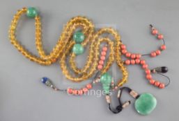 A Chinese court necklace, composed of amber style beads, coral coloured ceramics beads, faux jadeite