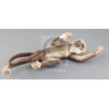 An unusual German porcelain figure of a climbing monkey, by Ernst Boehne & Sons, c.1887-1896, the