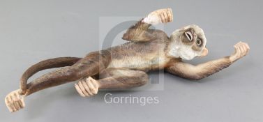 An unusual German porcelain figure of a climbing monkey, by Ernst Boehne & Sons, c.1887-1896, the