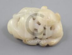 A Chinese white and russet jade carving of two cats eating lingzhi fungus, 18th/19th century, the