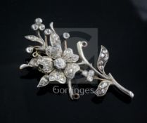 A 19th century gold, silver and diamond floral spray brooch, set with old mine and rose cut