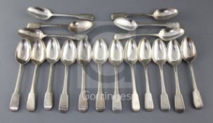A set of eighteen George III silver fiddle pattern dessert spoons, Eley, Fearn & Chawner, with