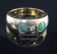 An 18ct gold and gypsy set jade and diamond five stone ring, size X.