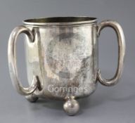 A Victorian large silver presentation tyg by Holland, Son & Slater, with horse racing related